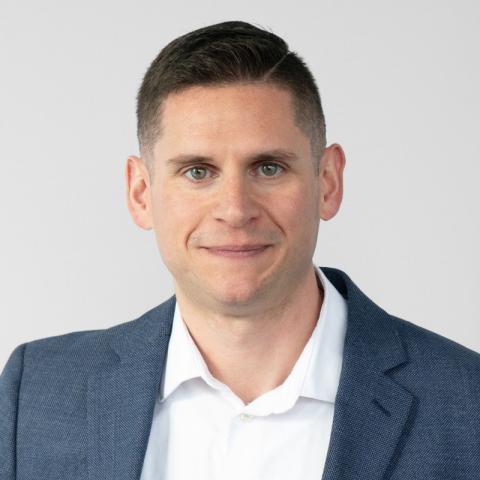 Headshot of Joshua DeLung.