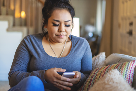 Woman looking at her phone.