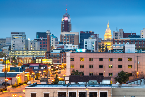 Downtown Lansing, Michigan's state capital city skyline at twilight.